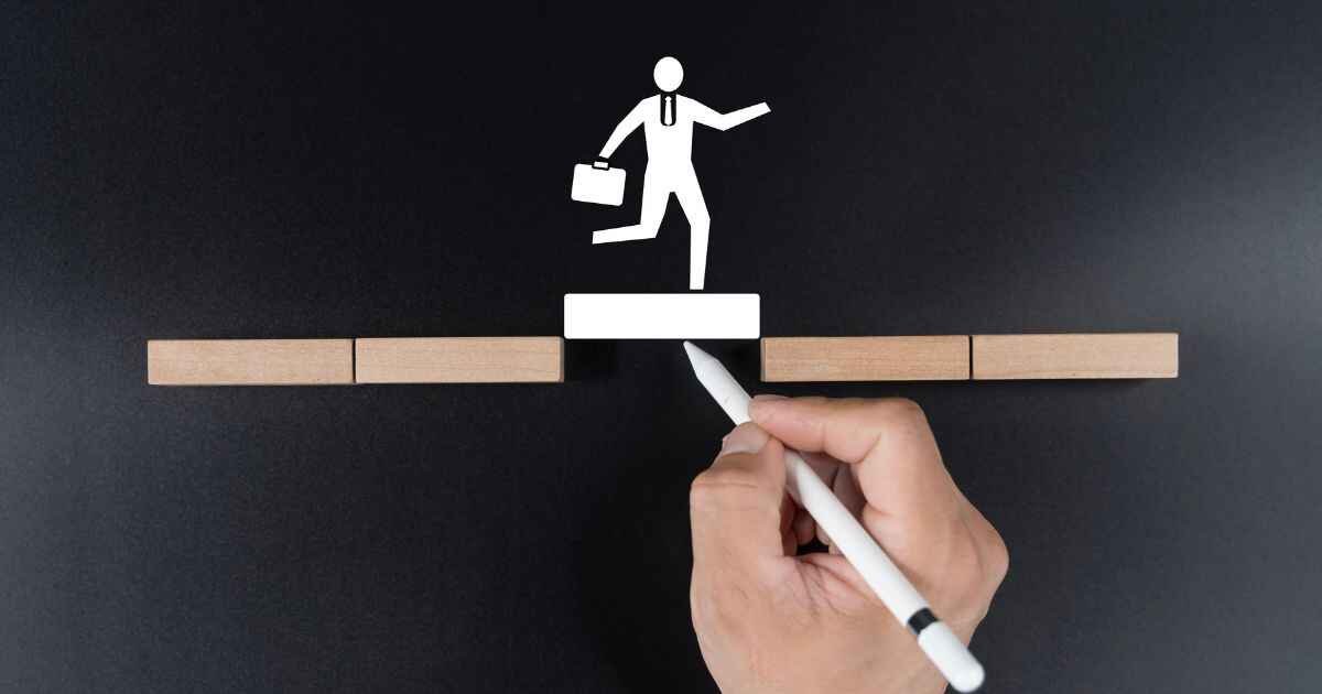 Image of a broken bridge between a small island labeled "Pilot Project" and a large mainland labeled "Enterprise Scale," symbolizing the gap caused by AI Strategy Failures.